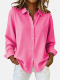 Pink classic-cut women's blouse in a timeless, elegant style