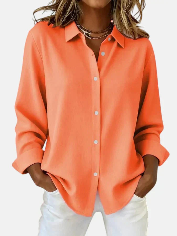 Pink classic-cut women's blouse in a timeless, elegant style