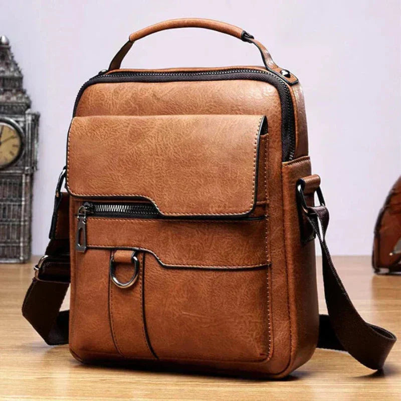 A woman carrying a roomy light brown practical handbag on her shoulder during a busy day out.