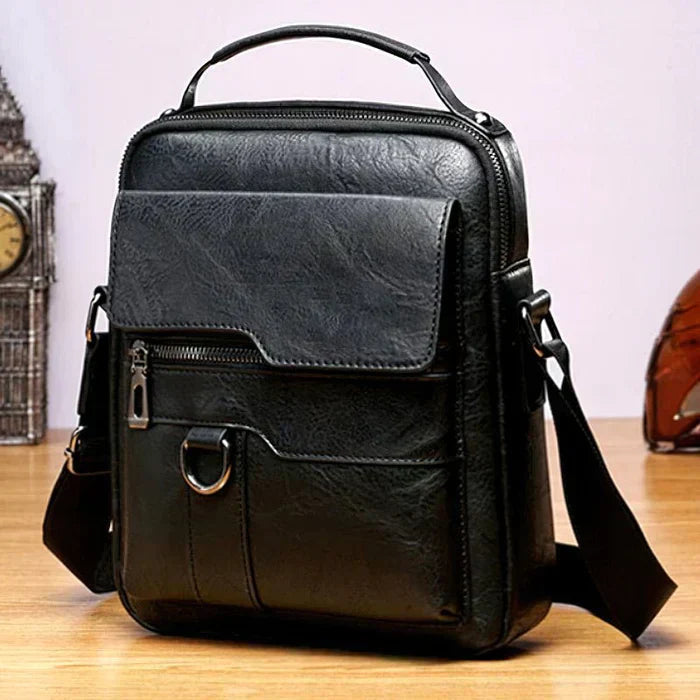 A woman carrying a roomy light brown practical handbag on her shoulder during a busy day out.