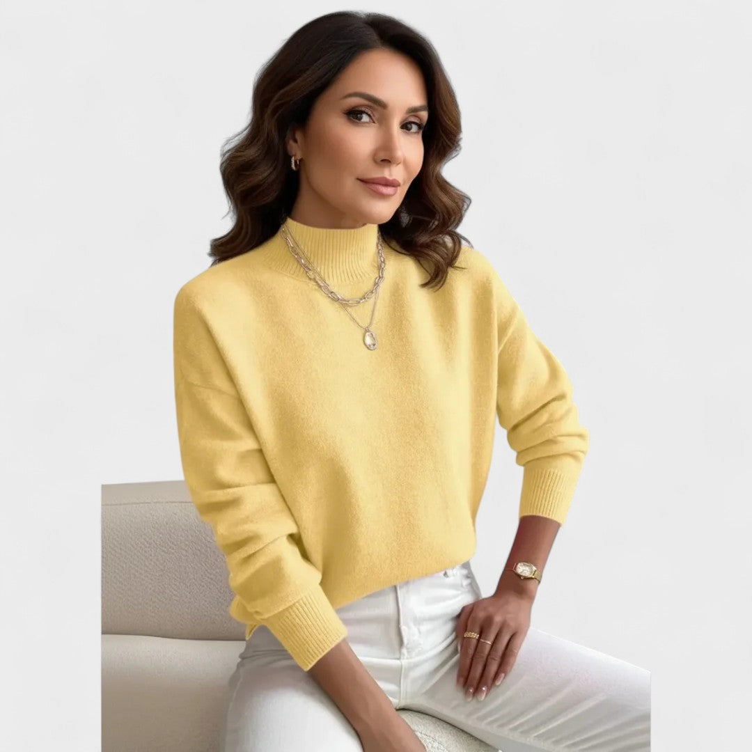 Soft roll-neck jumper in a close, elegant fit available in white, black and pastel shades