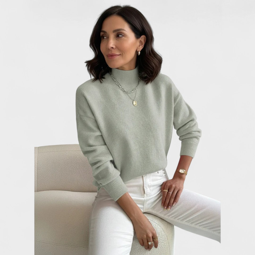 Soft roll-neck jumper in a close, elegant fit available in white, black and pastel shades