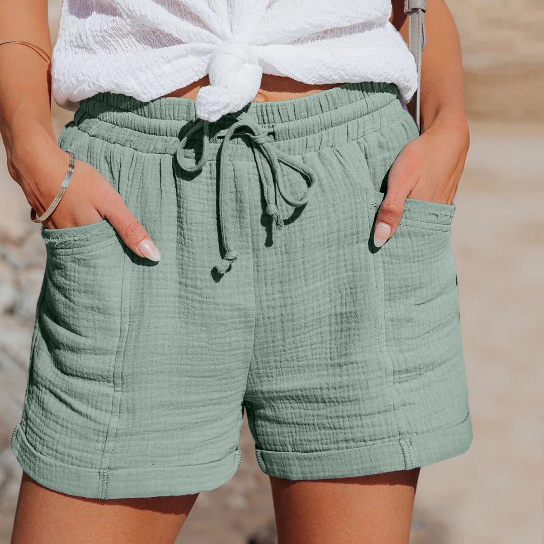 Women's high-waist shorts in purple with a relaxed, airy cut and tie fastening