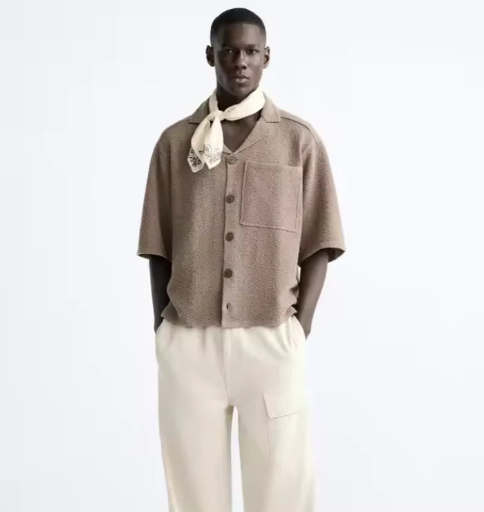 Men's relaxed-fit heritage shirt in a light neutral tone with a fluid drape