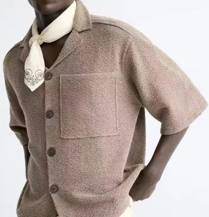 Men's relaxed-fit heritage shirt in a light neutral tone with a fluid drape