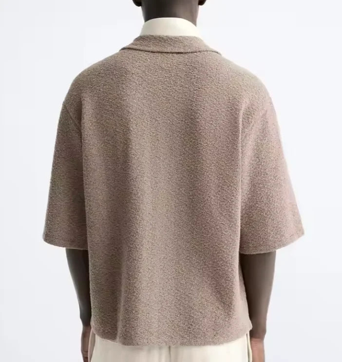 Men's relaxed-fit heritage shirt in a light neutral tone with a fluid drape