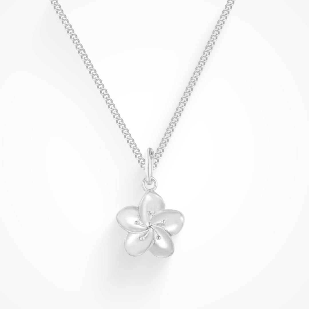 Hibiscus flower pendant necklace in gold tone on a white background
