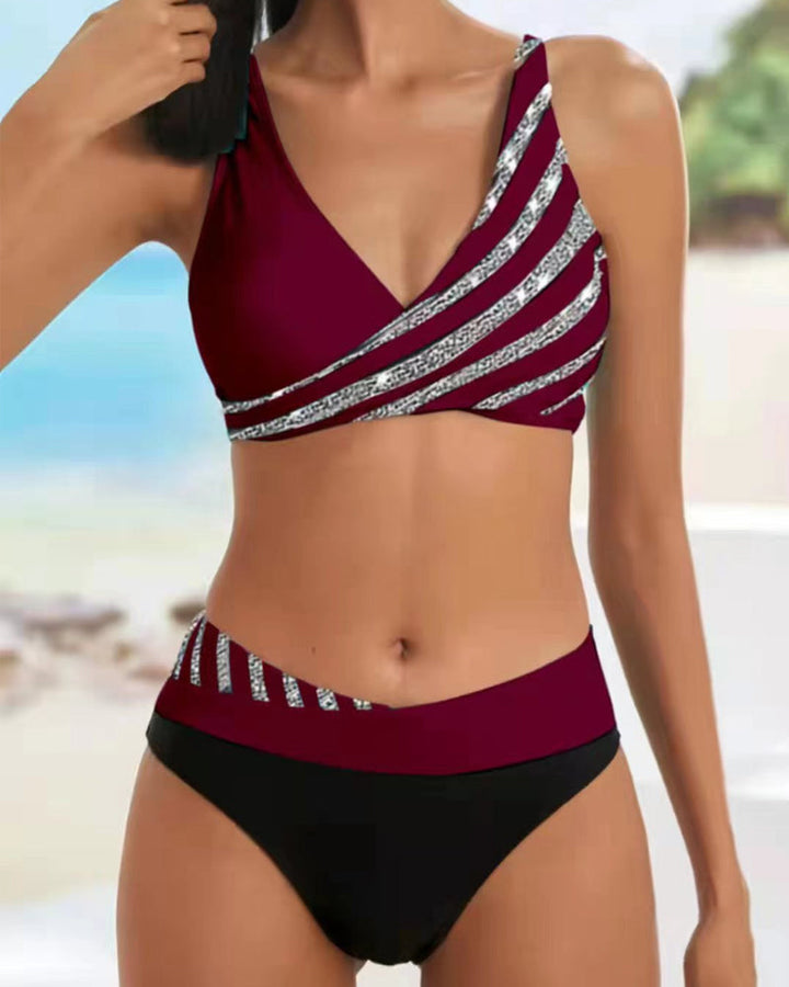 High-waist bikini with a baroque print in warm gold and jewel tones