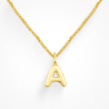 Layering necklace in gold and silver tones displayed on a clean background