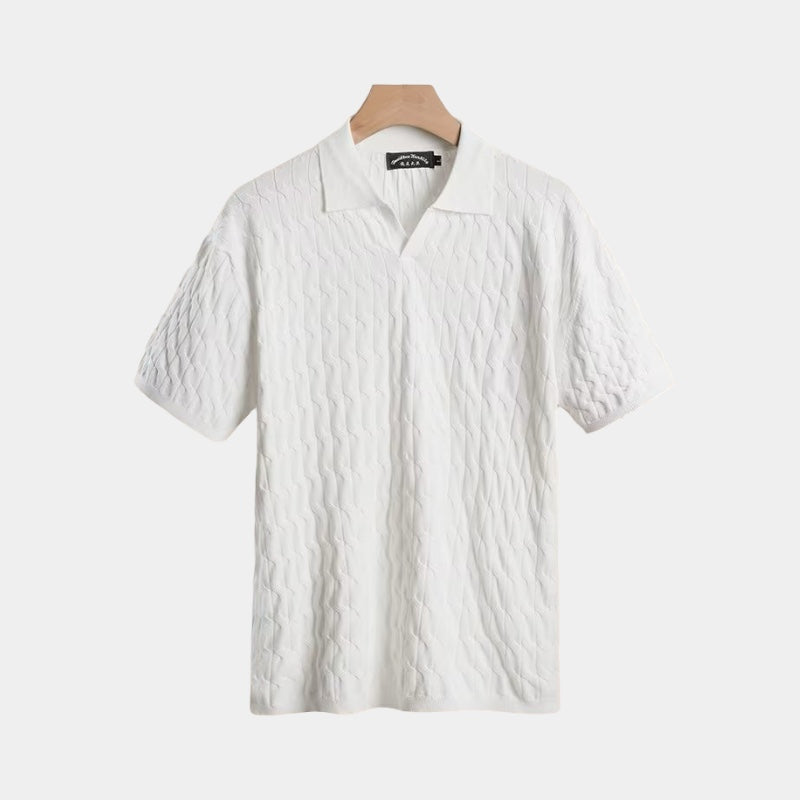 Men's white textured polo shirt with classic collar and clean structured fit