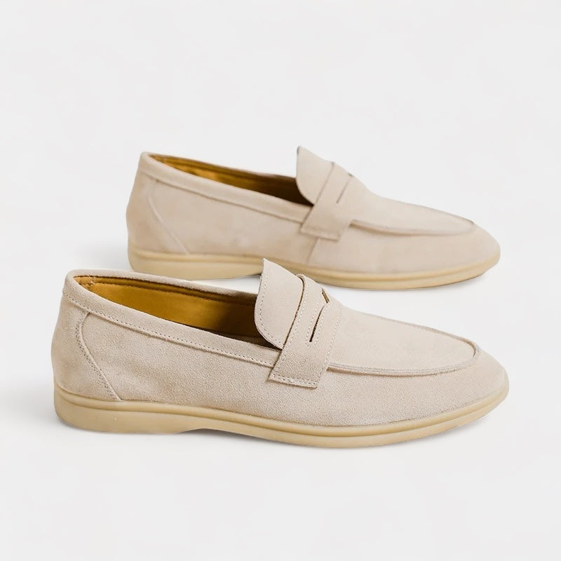 Men's classic slip-on loafers in beige and black with a neat, timeless silhouette