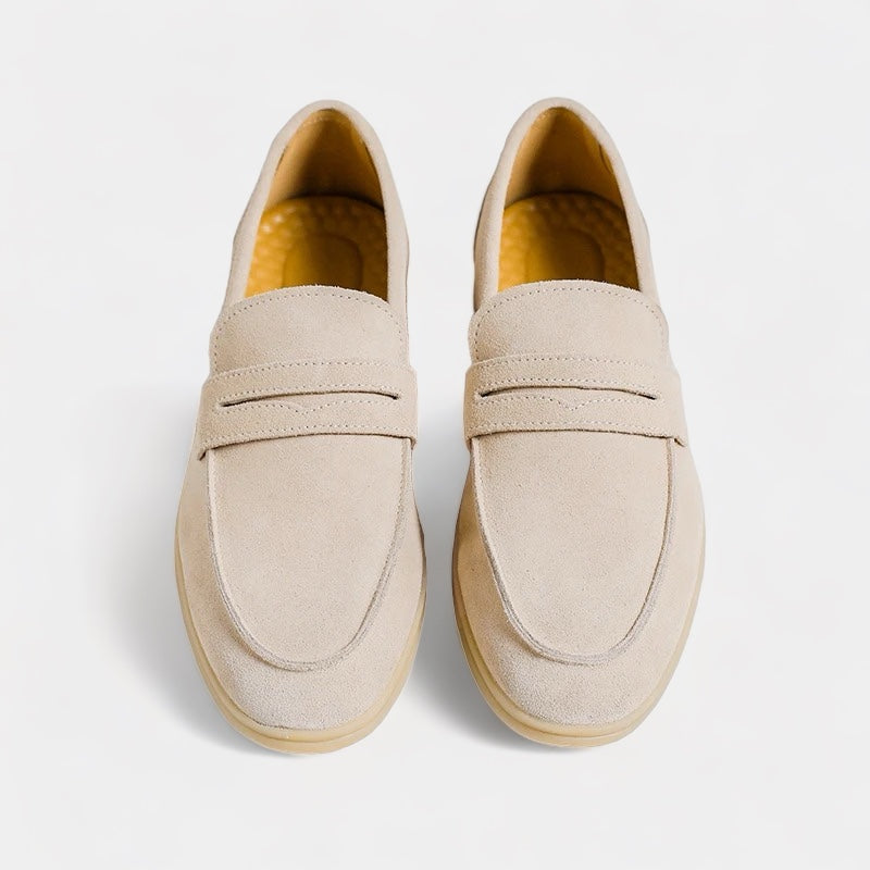 Men's classic slip-on loafers in beige and black with a neat, timeless silhouette