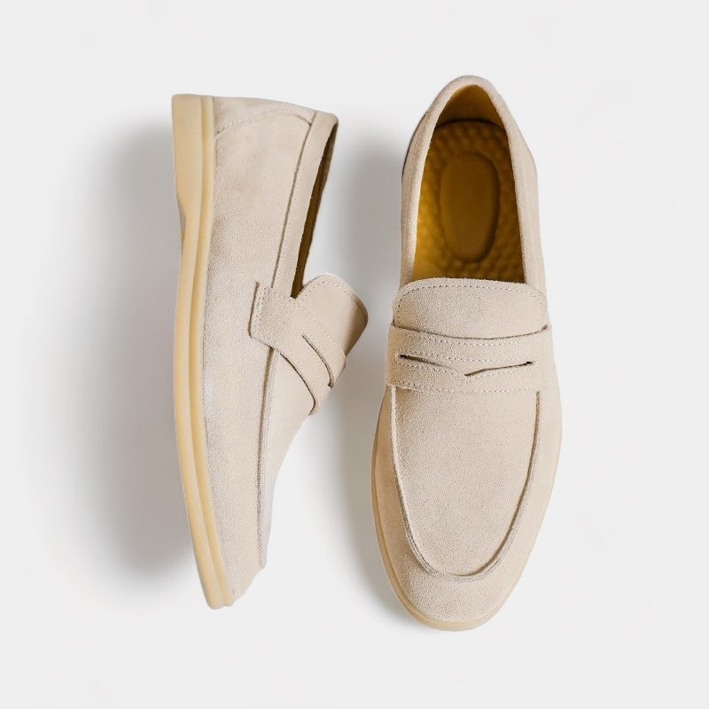 Men's classic slip-on loafers in beige and black with a neat, timeless silhouette