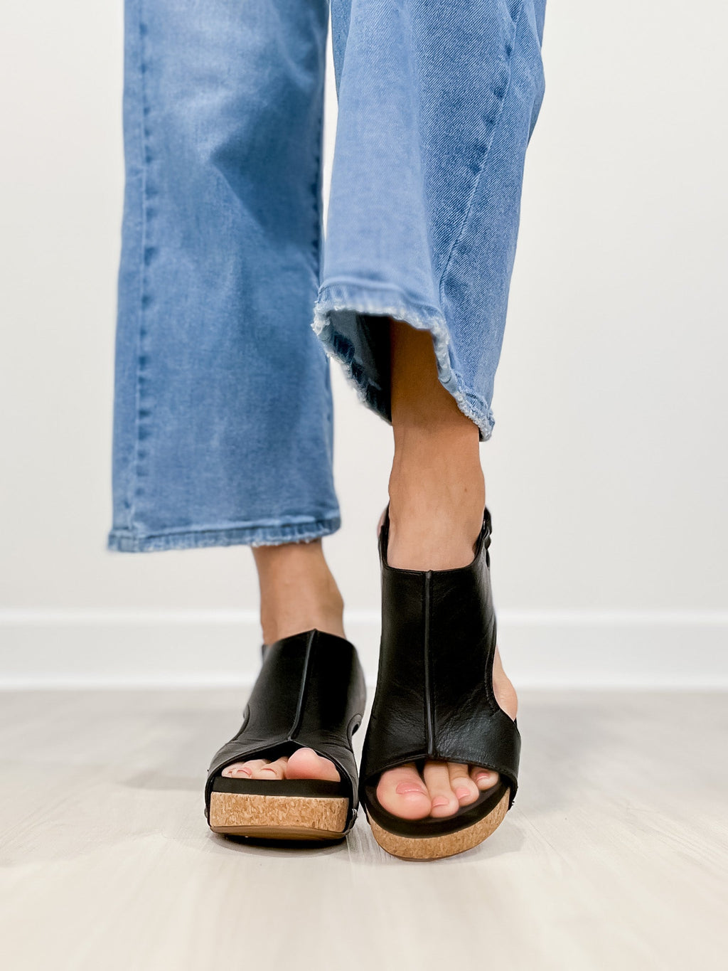 Glitter wedge sandals in silver with an ankle strap and a sparkling upper
