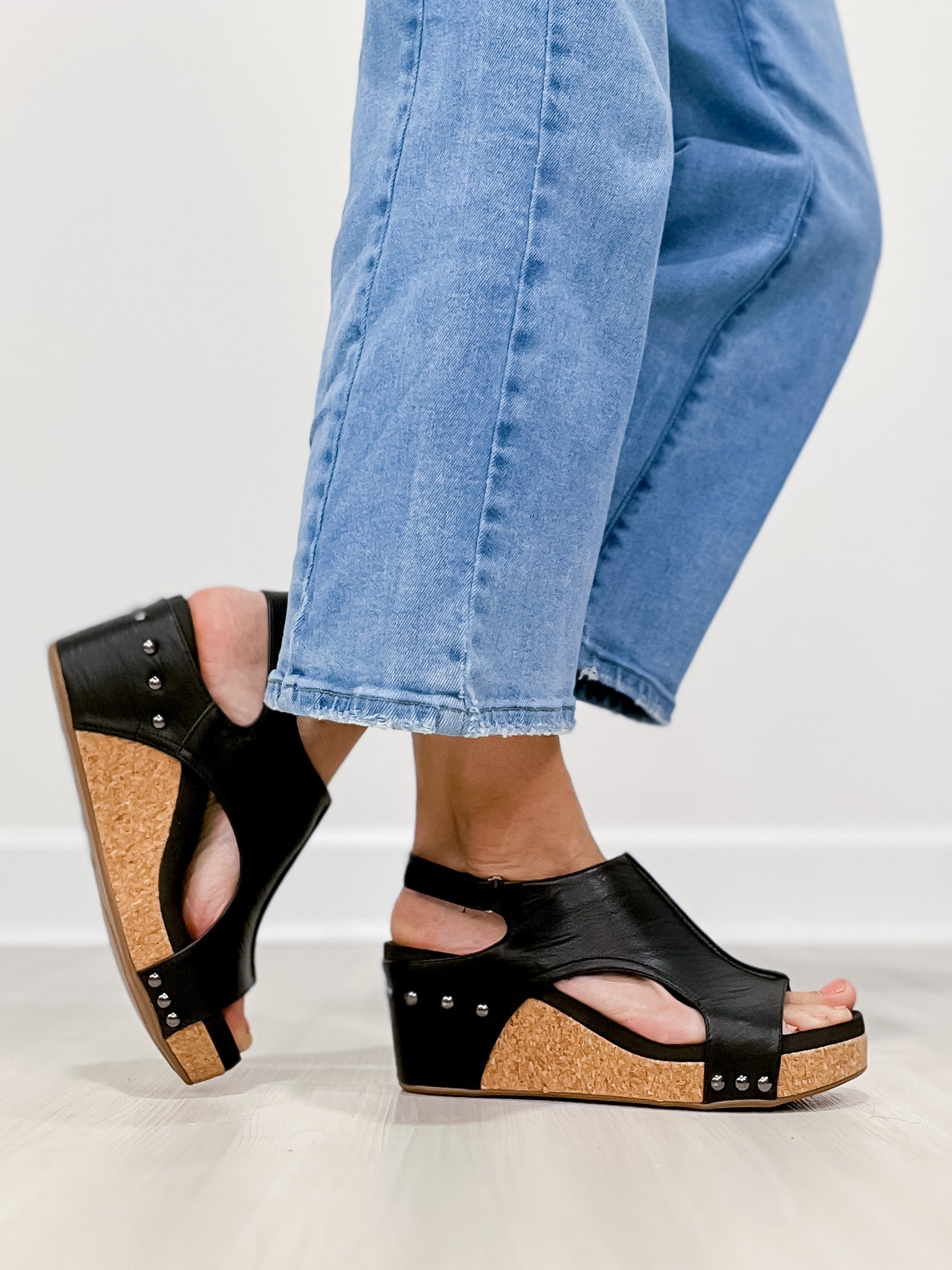 Glitter wedge sandals in silver with an ankle strap and a sparkling upper