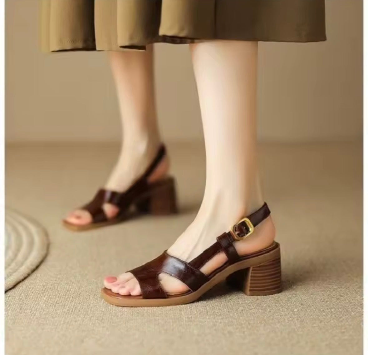 Apricot slingback heels with a single clean strap and wide block heel