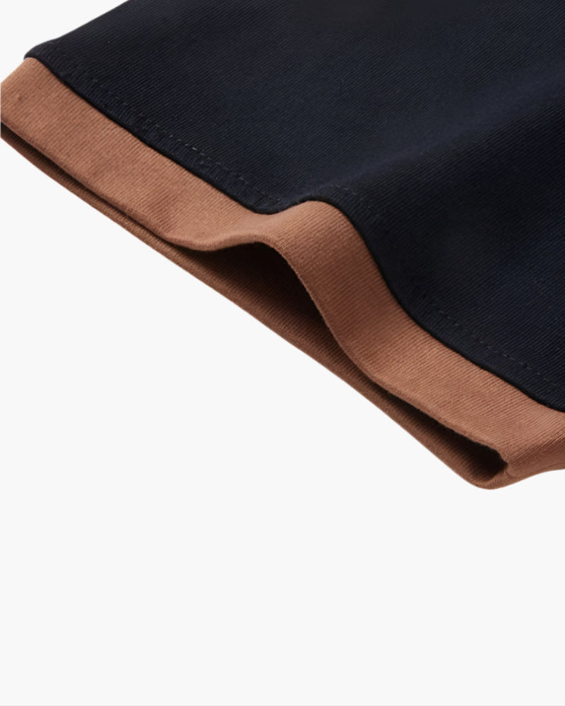 Men's classic polo shirt with contrasting collar trim in a clean, relaxed fit