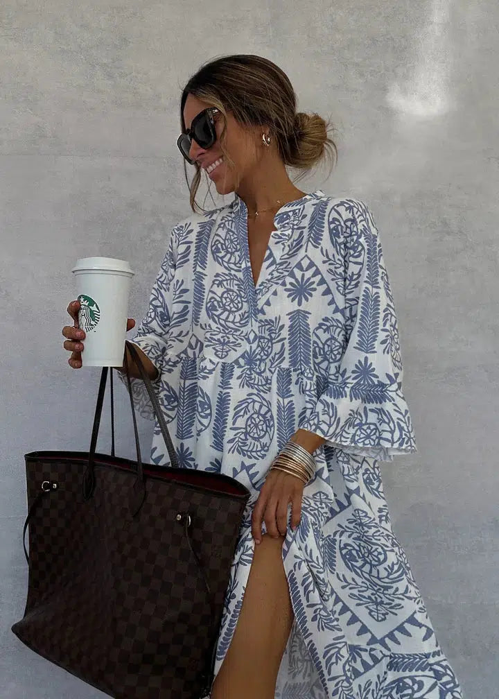 Woman wearing the Vivienne button-front boho tunic dress, relaxed on a casual day out.