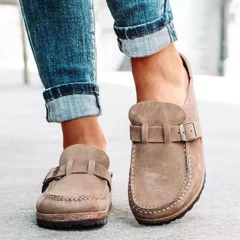 Taupe backless clogs with closed toe and adjustable buckle strap