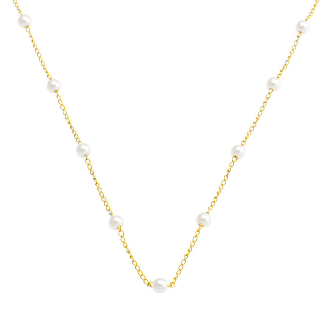 Gold initial letter pendant necklace on fine polished chain