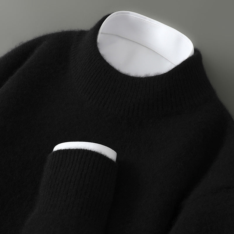 A woman wearing a soft luxe crew neck jumper with a matte finish, styled with smart trousers.