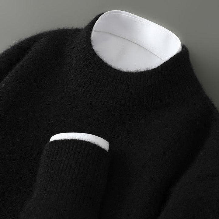 A woman wearing a soft luxe crew neck jumper with a matte finish, styled with smart trousers.