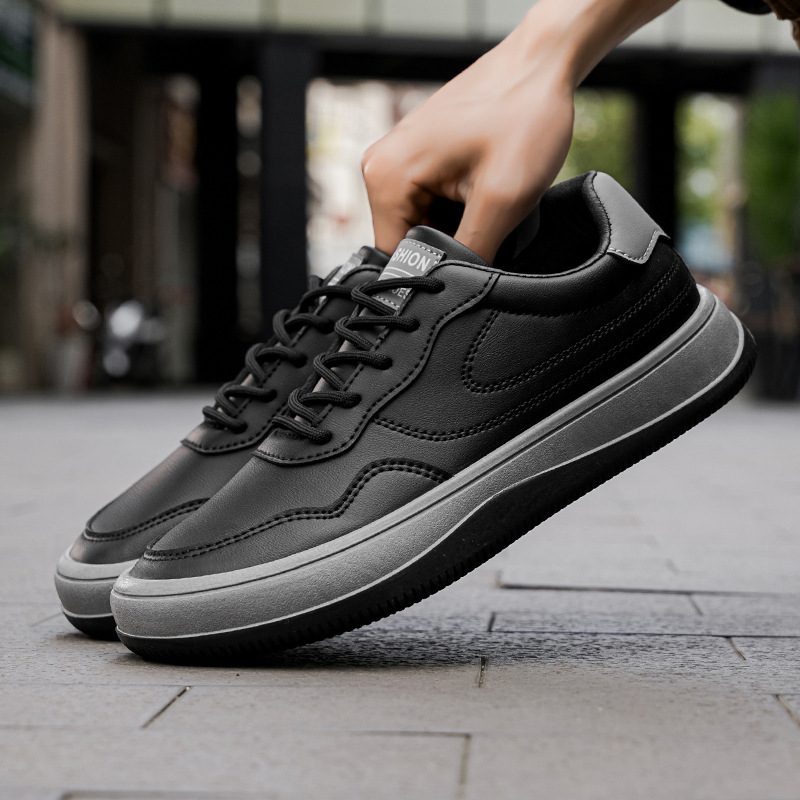 Men's white premium smooth-finish trainers with a clean low-profile silhouette and refined upper