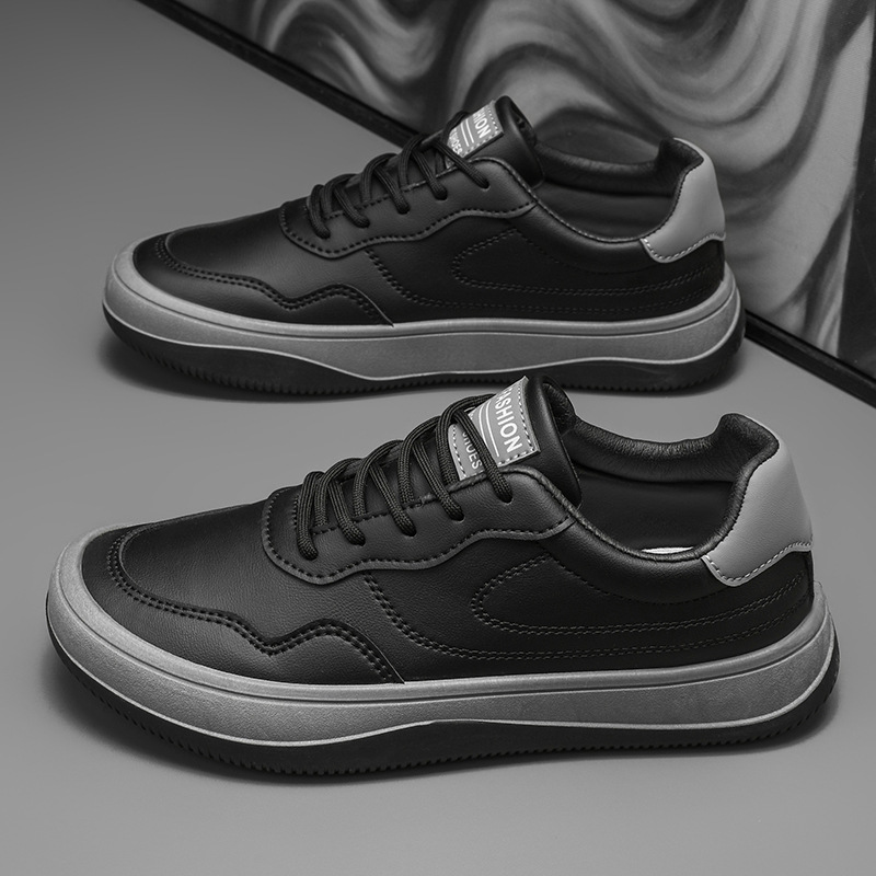 Men's white premium smooth-finish trainers with a clean low-profile silhouette and refined upper