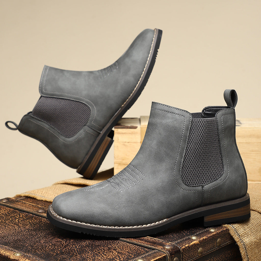 Men's brown smart Chelsea boots with elastic side panels and a sturdy structured sole