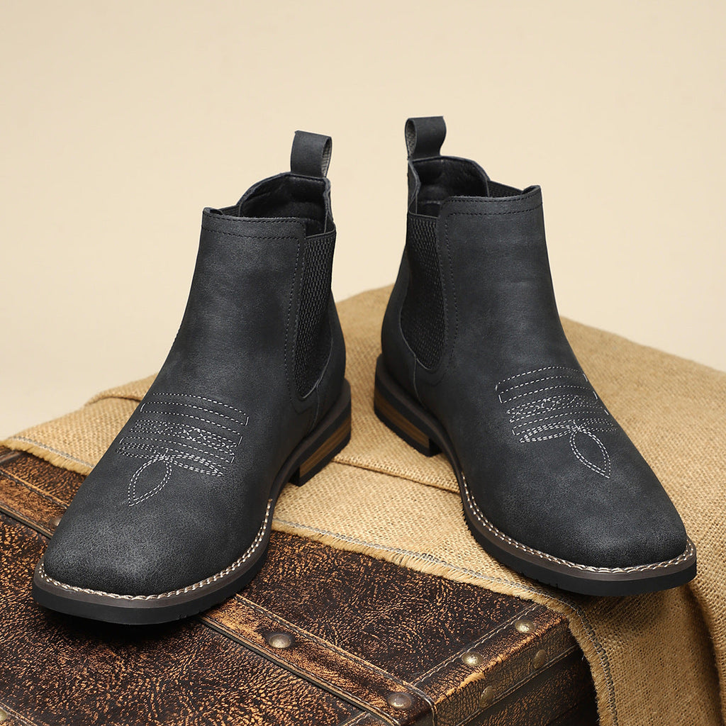 Men's brown smart Chelsea boots with elastic side panels and a sturdy structured sole