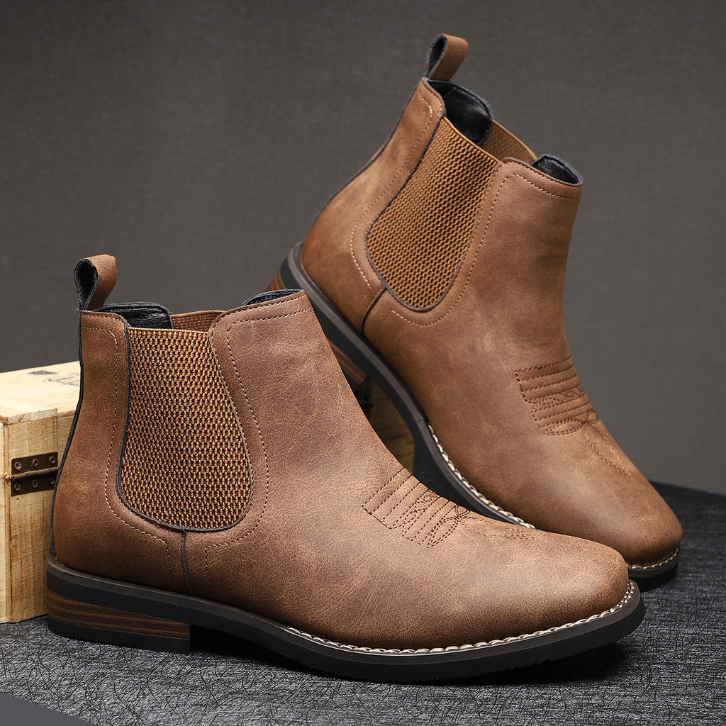 Men's brown smart Chelsea boots with elastic side panels and a sturdy structured sole