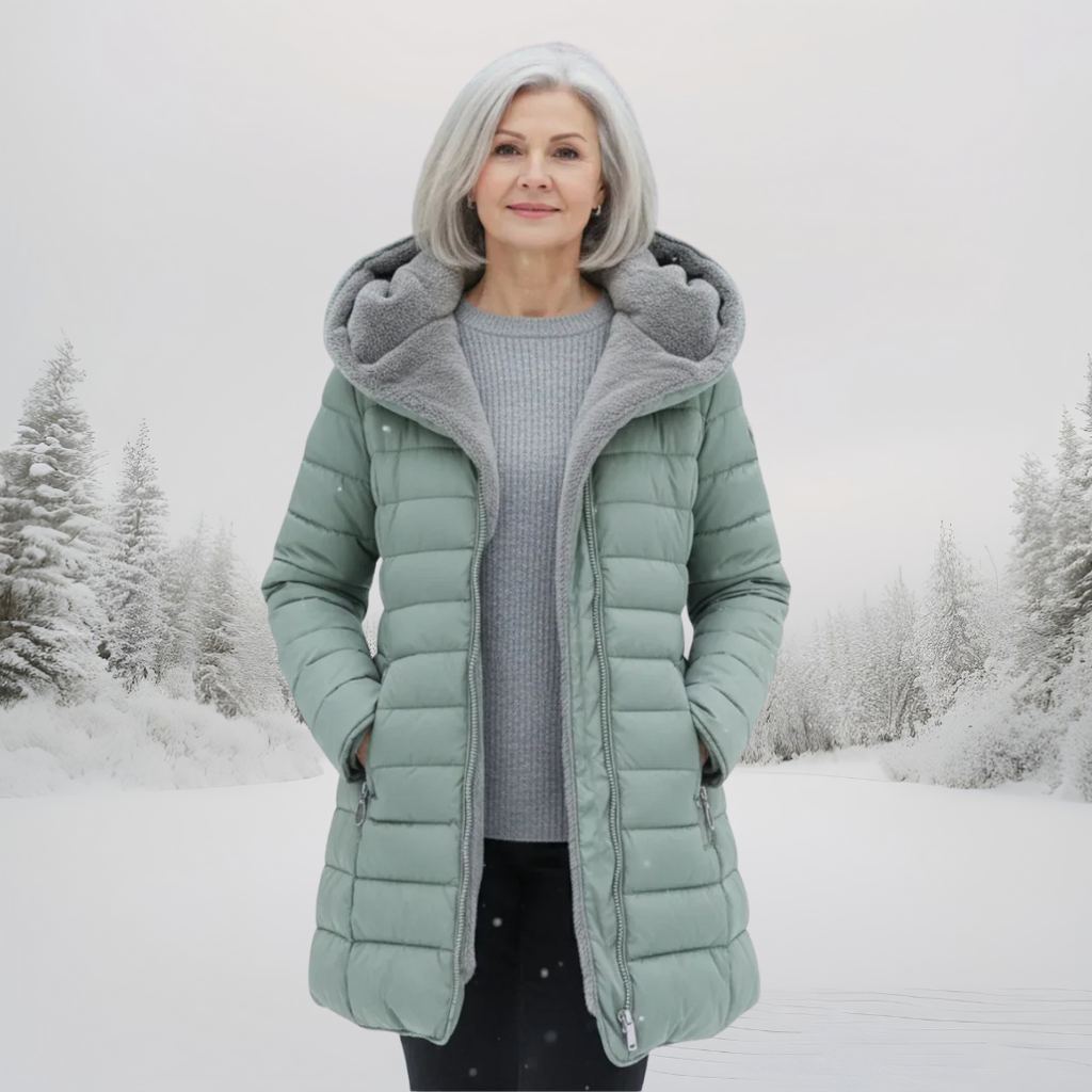 Down-filled long coat in light green, black and dark green with a classic, structured silhouette