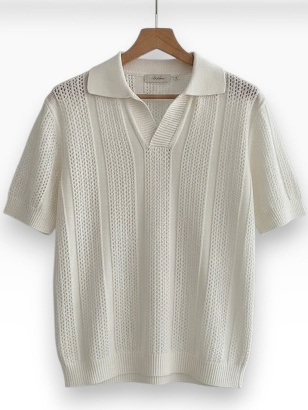 Men's heritage polo shirt in white with a subtle textured finish and classic collar