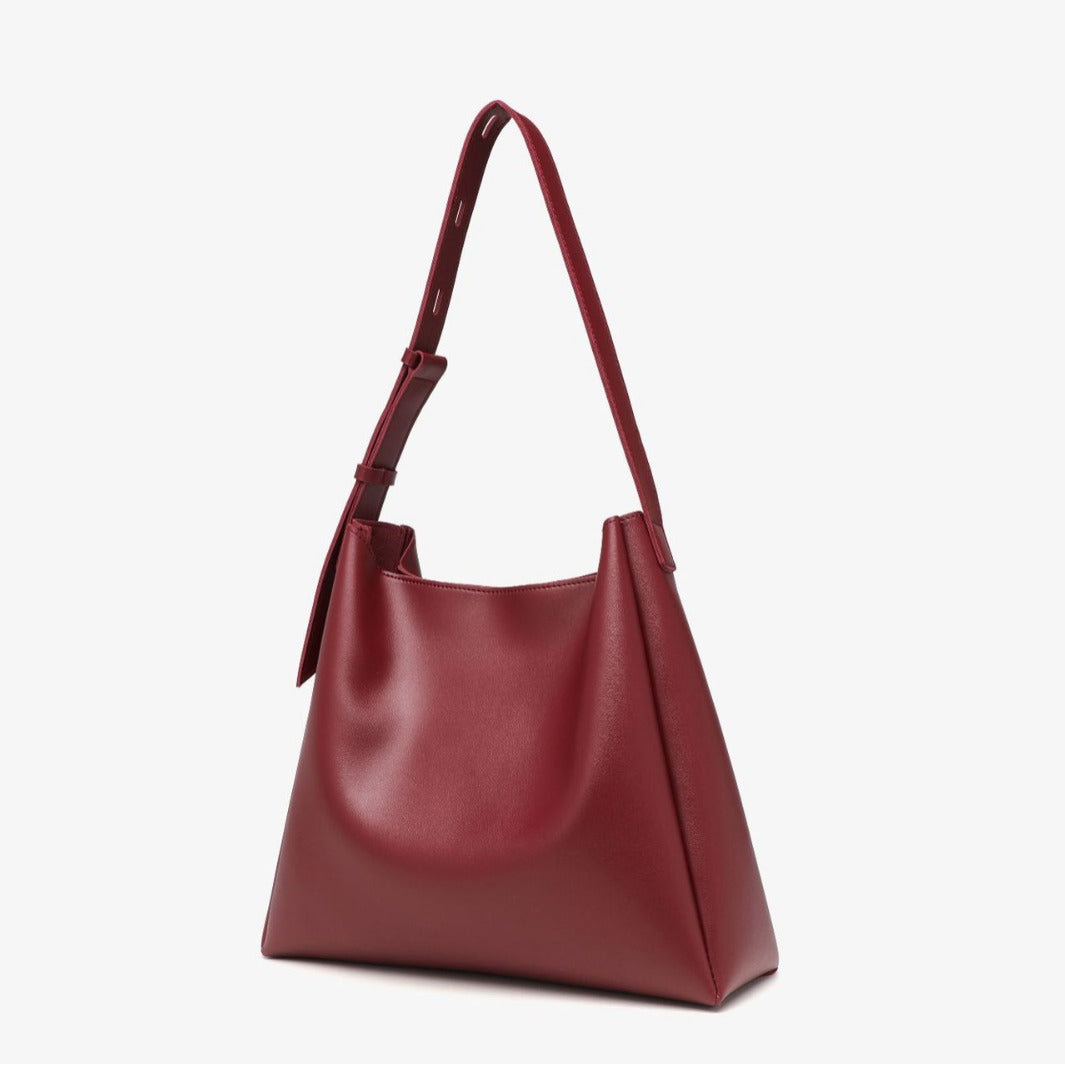 Elegant structured tote bag in black with clean minimalist lines and comfortable shoulder strap