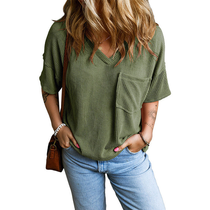 Grey relaxed V-neck top with wide sleeves and a small front pocket
