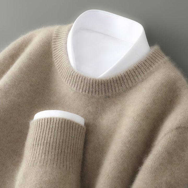 A woman wearing a soft warm jumper layered over a shirt on a cold day.