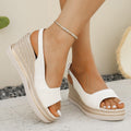 Peep-toe wedge sandals with a back strap in white, black and gold