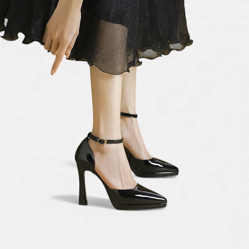 A woman in pointed ankle-strap pumps with a block heel, dressed for a day-to-night occasion.