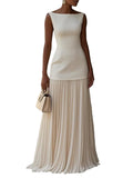 Elegant dress with a structured bodice and pleated skirt in beige, also available in pink, black, light blue and pale yellow