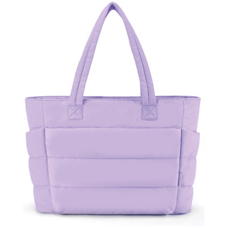 Ultralight quilted tote bag in soft pink with zip closure and shoulder straps