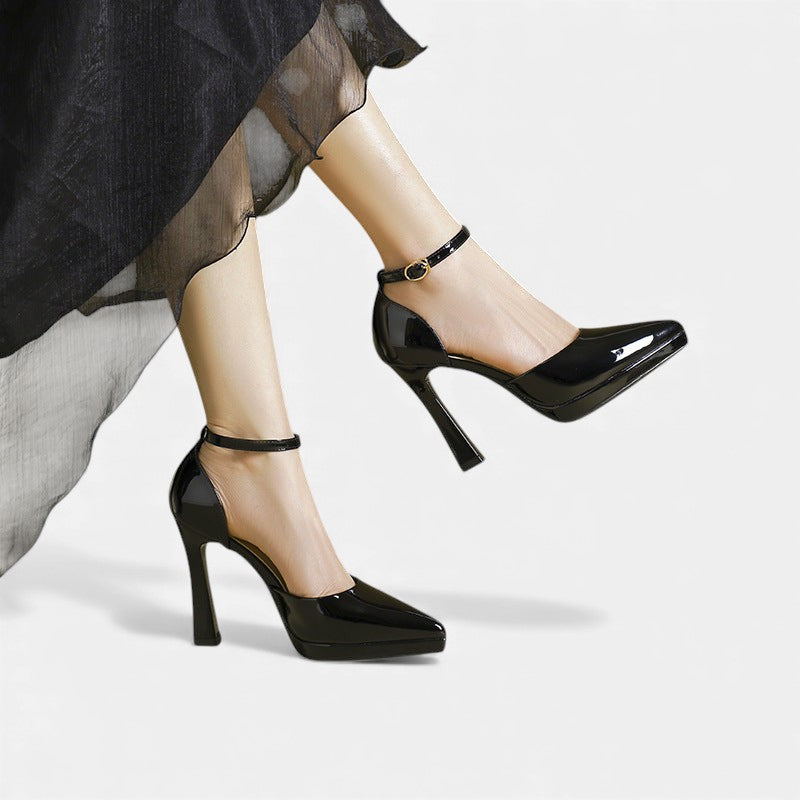 A woman in pointed ankle-strap pumps with a block heel, dressed for a day-to-night occasion.