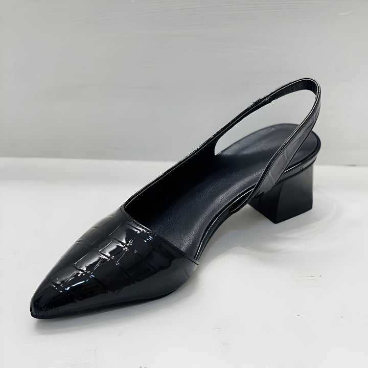 Black orthopaedic comfort heels with a wide toe box and low supportive heel