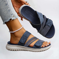 Navy sport flat sandals with elastic straps and cushioned sole