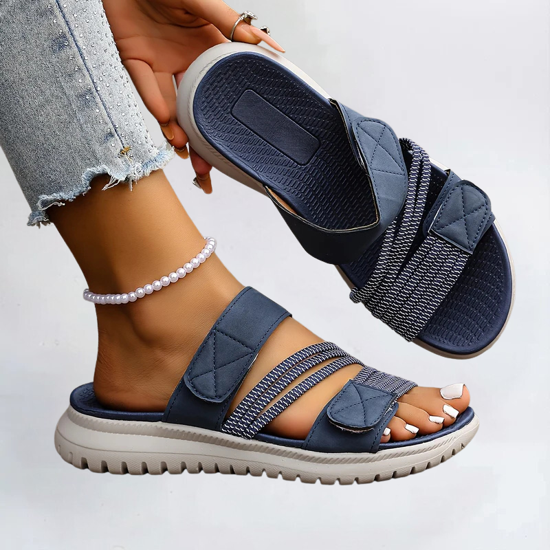 Navy sport flat sandals with elastic straps and cushioned sole