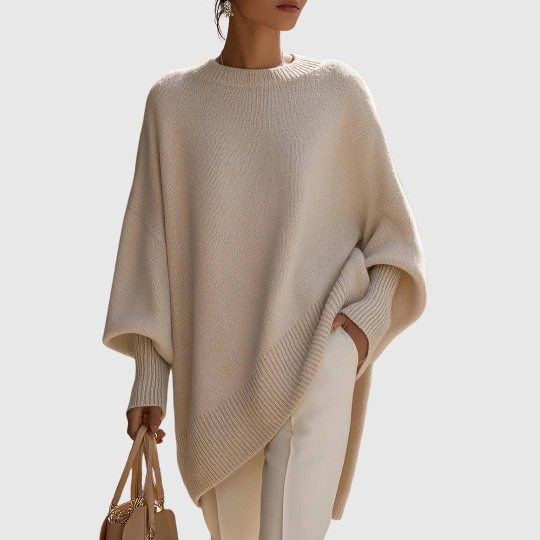 A woman wearing a soft crew neck jumper with jeans for a warm, easy everyday look.