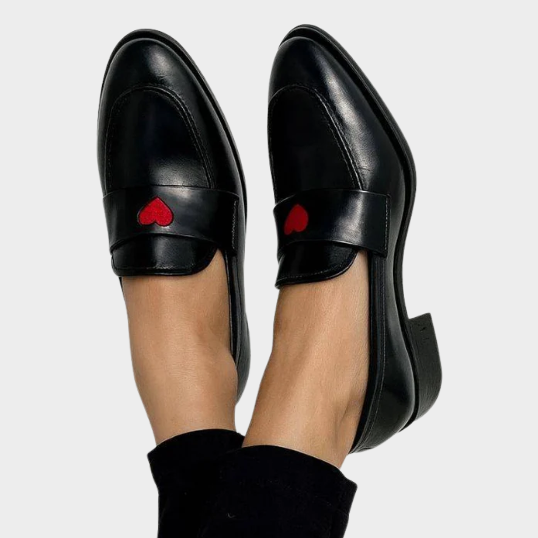A woman wearing elegant feminine comfort shoes on a charming day out.