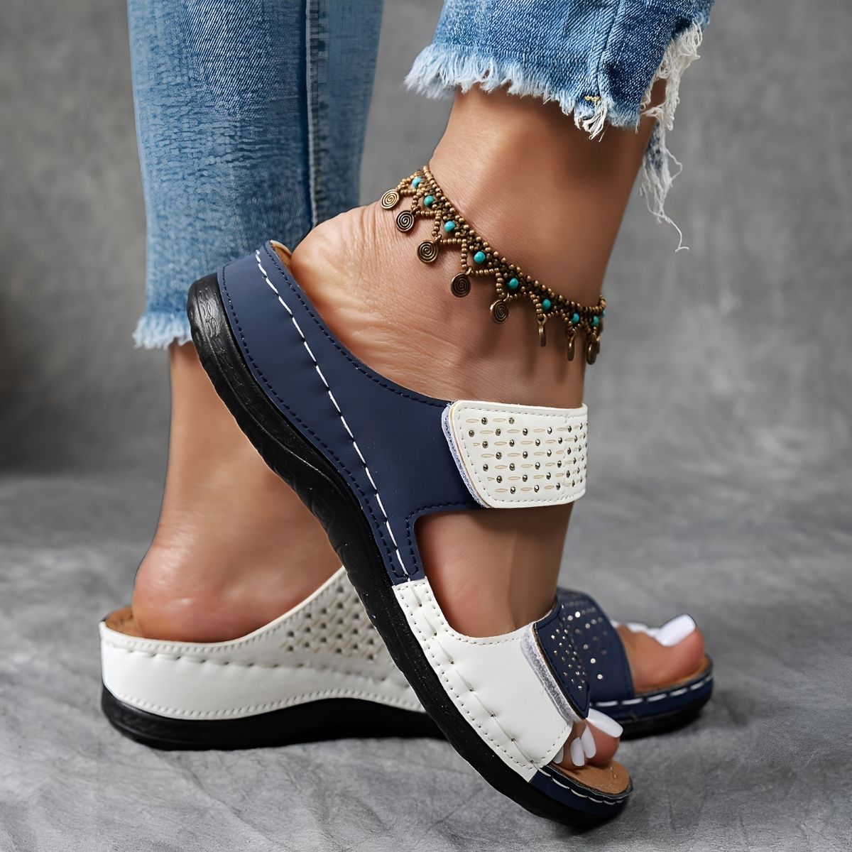 Simple wide-band backless sandals in white, blue, black and two-tone colourways