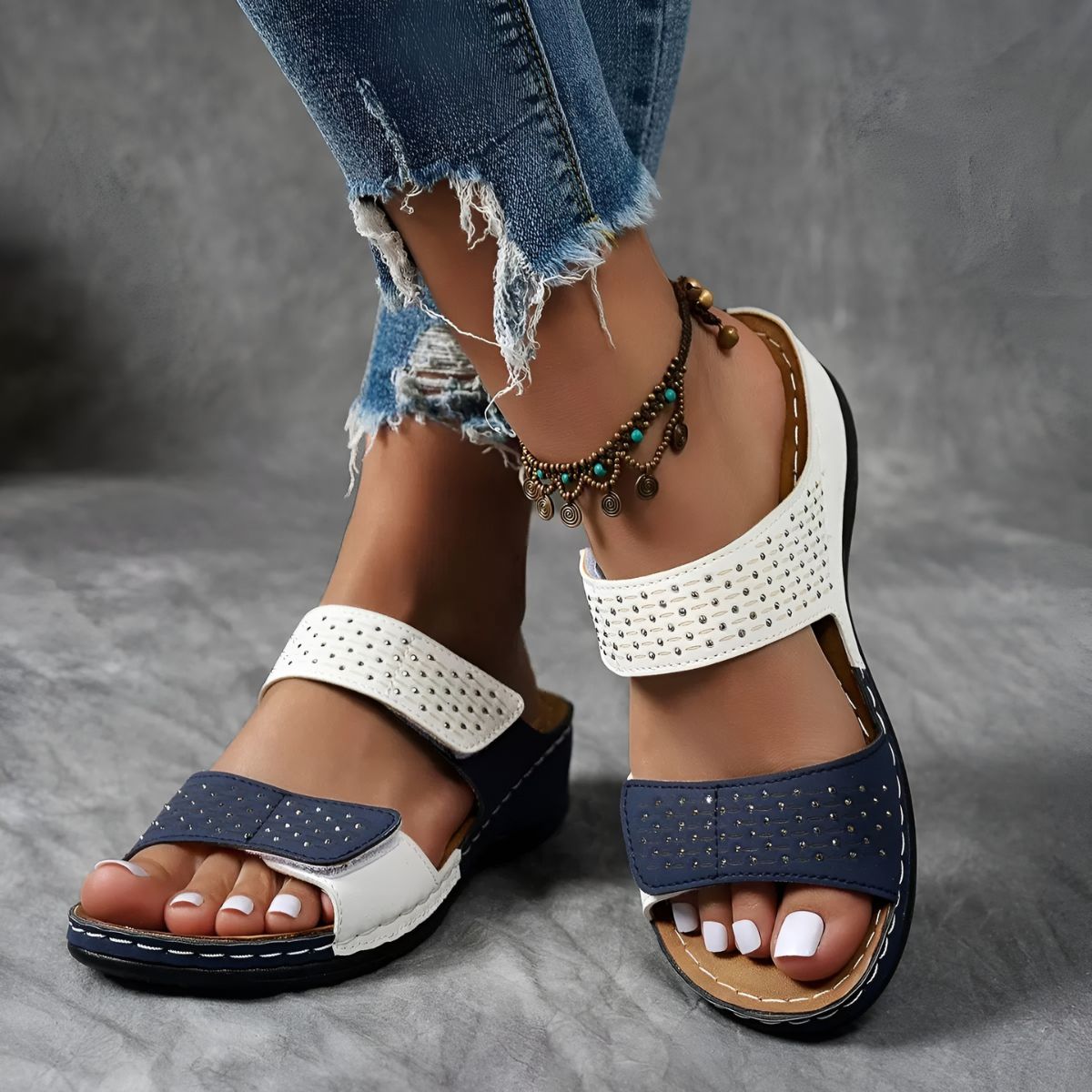 Simple wide-band backless sandals in white, blue, black and two-tone colourways