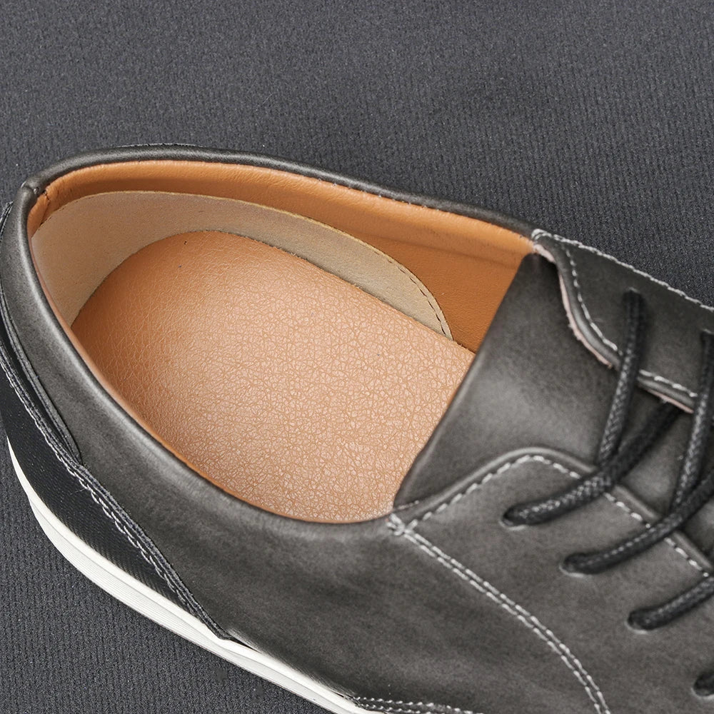 Men's light tan smart casual trainers with a smooth refined upper and clean low-profile sole
