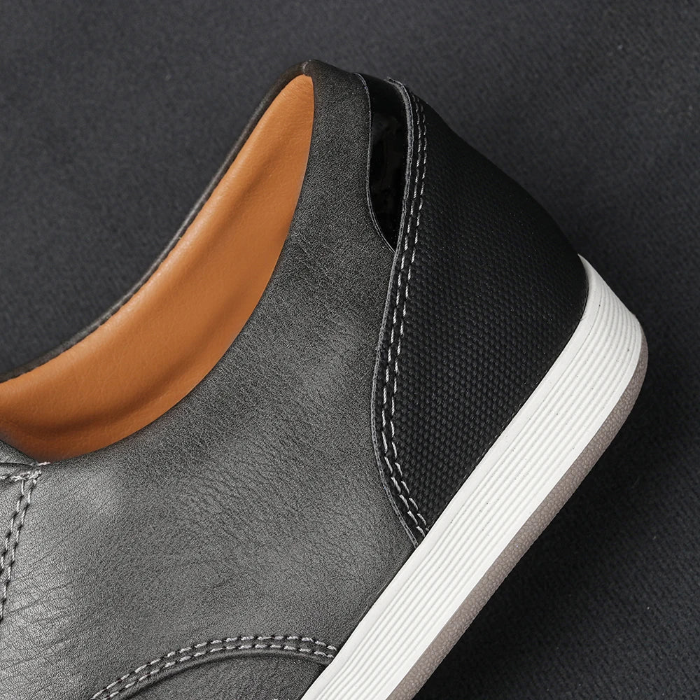 Men's light tan smart casual trainers with a smooth refined upper and clean low-profile sole